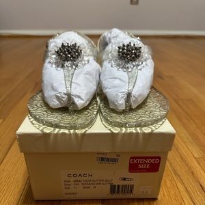 Women’s clear Coach Jellies